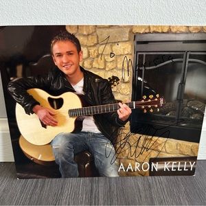 Aaron Kelly autographed poster - like new condition